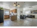 Inviting living space with modern kitchen, tile flooring, and comfortable seating area at 154 W 5Th St # 212, Tempe, AZ 85281