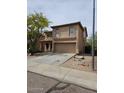 Two-story home features neutral stucco, tile roof, two car garage and desert landscaping at 2514 W Big Oak St, Phoenix, AZ 85085