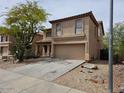 View of the front exterior of a two-story home with desert landscaping at 2514 W Big Oak St, Phoenix, AZ 85085