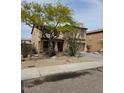 Charming two-story home with desert landscaping, tile roof and a covered front porch at 2514 W Big Oak St, Phoenix, AZ 85085