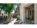 Charming townhome featuring covered porch, desert landscaping and views of neighborhood park at 3131 E Legacy Dr # 2055, Phoenix, AZ 85042