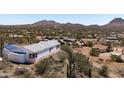 This well-maintained home offers desert views and easy access to hiking trails at 49039 N 24Th Ave, New River, AZ 85087