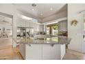 Bright kitchen featuring granite countertops, stainless steel appliances, and plenty of storage space at 9780 E Gamble Ln, Scottsdale, AZ 85262