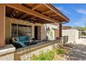 Inviting covered patio with comfortable seating, string lights, and a pleasant outdoor ambiance at 13636 N Hamilton Dr # 101, Fountain Hills, AZ 85268