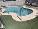 Private backyard pool with seating and block fencing for outdoor enjoyment at 277 W 16Th Ave, Apache Junction, AZ 85120