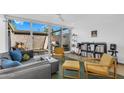 Stylish living room featuring modern furniture, sliding glass doors to a private patio, and ample space at 4411 N 40Th St # 59, Phoenix, AZ 85018