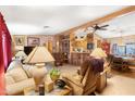 Inviting living room featuring an open layout, wood accents, and a cozy seating area at 535 S Alma School Rd # 85, Mesa, AZ 85210