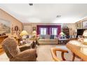 Spacious living area offering comfortable seating, ample lighting, and a welcoming atmosphere at 535 S Alma School Rd # 85, Mesa, AZ 85210