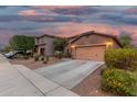 Lovely single-Gathering home with a two-car garage, long driveway and desert landscaping at 10811 W Avenida Del Rey --, Peoria, AZ 85383