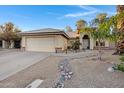 Well-maintained single-story home with a low-maintenance desert rock yard and lovely curb appeal at 1120 E Harbor View Dr, Gilbert, AZ 85234