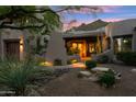 Cozy courtyard featuring desert landscaping, rock accents, and a neutral color palette creating a private outdoor space at 11398 E Desert Vista Rd, Scottsdale, AZ 85255