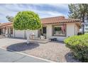 Charming single-story home featuring a desert landscape, front patio, and a well-maintained exterior at 2311 S Farnsworth Dr # 81, Mesa, AZ 85209