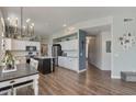Spacious kitchen with a large island, white cabinetry, and modern appliances at 3812 N Barron --, Mesa, AZ 85207
