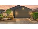 Charming single-Gathering home featuring a two-car garage and well-maintained landscaping at 8872 W Hollywood Ave, Peoria, AZ 85345