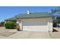 Inviting single-Gathering home with a two car garage and desert landscaping at 14626 N 40Th Way, Phoenix, AZ 85032