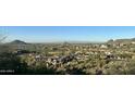 Expansive hillside home with breathtaking mountain views and professionally landscaped desert landscape at 15427 E Firerock Country Club Dr, Fountain Hills, AZ 85268