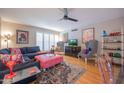 Stylish living room with comfortable seating, hardwood floors, and an open floor plan at 5102 N 31St Pl # 432, Phoenix, AZ 85016