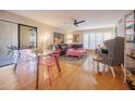 Open-concept living area with hardwood floors, ample light, and modern furnishings at 5102 N 31St Pl # 432, Phoenix, AZ 85016