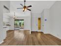 Open-concept living space flows to the front door and a serene outdoor patio at 17838 N 45Th Ave, Glendale, AZ 85308