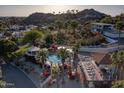 Stunning aerial view showcasing the pool, community amenities, and the desert landscape at 1808 E Hayward Ave # 1, Phoenix, AZ 85020