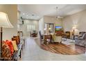 Spacious living room featuring tile and wood floors, neutral walls, and lots of natural light at 19115 E Buckskin Ct, Rio Verde, AZ 85263