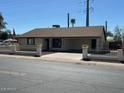 Inviting single-story home with a charming fence and well-maintained yard at 4716 S Fair Nw Ln, Tempe, AZ 85282