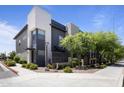 Contemporary home exterior featuring clean lines, modern architecture, and desert landscaping at 7531 E Billings St # 116, Mesa, AZ 85207