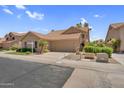 Charming single Gathering home with tile roof, desert landscaping, and attached two car garage at 9223 E Camino Del Santo --, Scottsdale, AZ 85260
