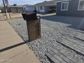 Stylish mailbox with a modern design and house numbers, set within a landscaped front yard at 13629 N 36Th St, Phoenix, AZ 85032
