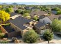 Back aerial view showing the home's roof, backyard, and surrounding community at 3003 E Ironside Ln, Gilbert, AZ 85298