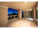 Inviting balcony featuring tile flooring and stunning views of the city skyline and mountain at 7175 E Camelback Rd # 902, Scottsdale, AZ 85251
