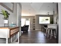 Inviting open-concept living space showcasing stylish décor, a bright ambiance, and seamless flow to other rooms at 7635 E Verde Ln, Scottsdale, AZ 85251