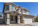 Attractive two-story home with a well-maintained front exterior and tiled roof at 15324 W Windsor Ave, Goodyear, AZ 85395