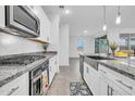 Modern kitchen featuring stainless steel appliances and granite countertops at 22560 E Rosa Rd, Queen Creek, AZ 85142