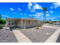 Charming single story home featuring well-maintained landscaping and classic desert appeal at 3160 E Main St # 110, Mesa, AZ 85213