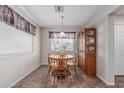 Cozy breakfast nook with natural light, ideal for enjoying casual meals near a window at 3915 S 186Th Ln, Goodyear, AZ 85338