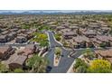 An aerial view of the community showcases the well-maintained streets and homes in a peaceful environment at 3932 E Melinda Dr, Phoenix, AZ 85050