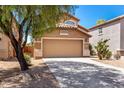Lovely home with a two-car garage and low-maintenance landscaping at 4034 E Mine Shaft Rd, San Tan Valley, AZ 85143