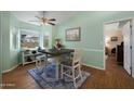 Cozy dining area with a large window and modern decor, filled with natural light at 5830 E Mckellips Rd # 2, Mesa, AZ 85215