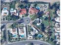 Aerial view of a property showcasing the triangular lot, mature landscaping, and nearby amenities at 8637 E Appaloosa Trl, Scottsdale, AZ 85258