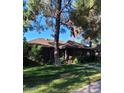Charming brick home with a manicured lawn and mature landscaping at 930 E Page St, Gilbert, AZ 85234