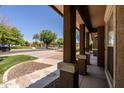 Covered walkway shows well-kept common area and sidewalks at 14250 W Wigwam Blvd # 121, Litchfield Park, AZ 85340