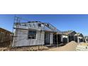 Exterior view of a home under construction, showcasing the framing and initial stages of development at 7604 W Saddlehorn Rd, Peoria, AZ 85383