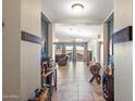 An open foyer that transitions into an open-concept living area at 7936 S 7Th Way, Phoenix, AZ 85042