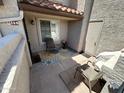 Cozy front porch with seating area, potted plants, and a decorative floral rug at 839 S Westwood S -- # 169, Mesa, AZ 85210