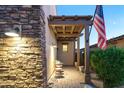 Inviting outdoor patio space with a pergola, perfect for relaxation and outdoor dining at 8691 E Eastwood Cir, Carefree, AZ 85377