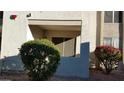 Exterior view of a condo with desert landscaping and a shaded patio at 10610 S 48Th St # 1074, Phoenix, AZ 85044