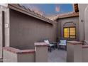 Cozy outdoor patio area with stylish seating, offering a perfect spot for relaxation and entertaining at 3842 W Ironwood Dr, Chandler, AZ 85226