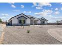 Beautiful single-Gathering home showcasing stone accents and a well maintained gravel yard at 3989 E Freeman Ln, San Tan Valley, AZ 85140