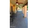 Covered outdoor seating area for entertaining or enjoying the outdoors at 6372 W Redfield Rd, Glendale, AZ 85306